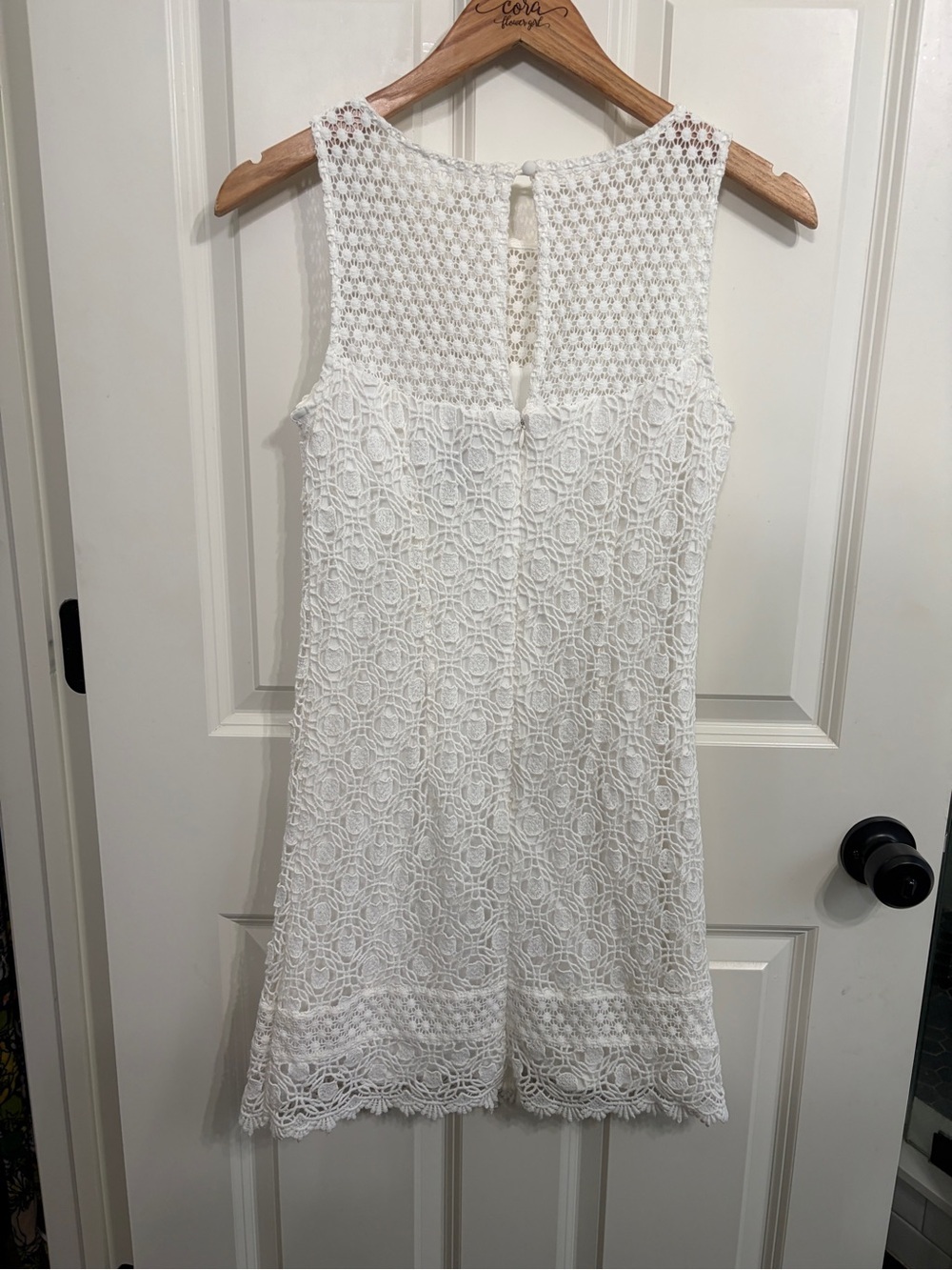 Like new White House Black Market sleeveless shift dress in white crochet lace. - Picture 3 of 8